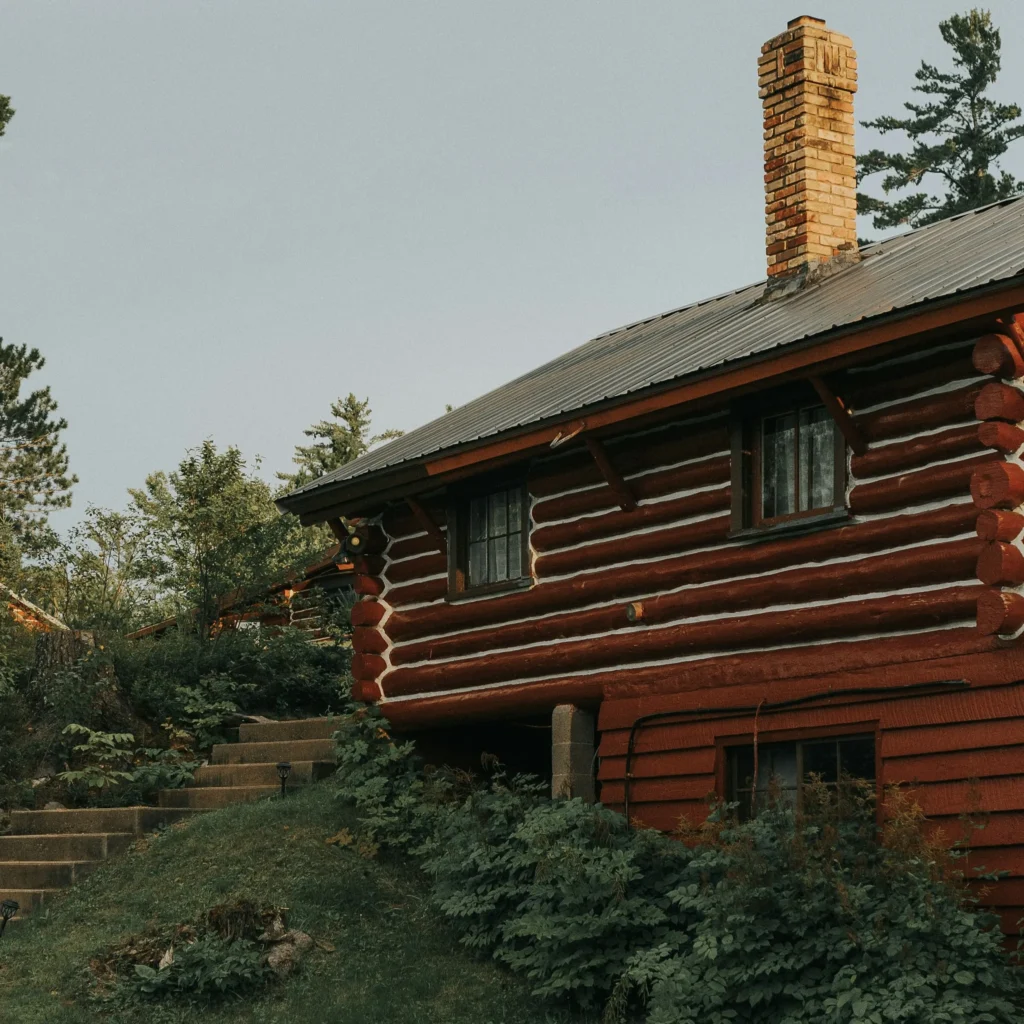 professional staining services done on a log cabin